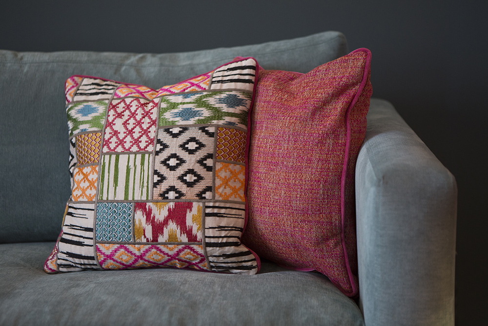 psychology of interior design plumped cushions on sofa